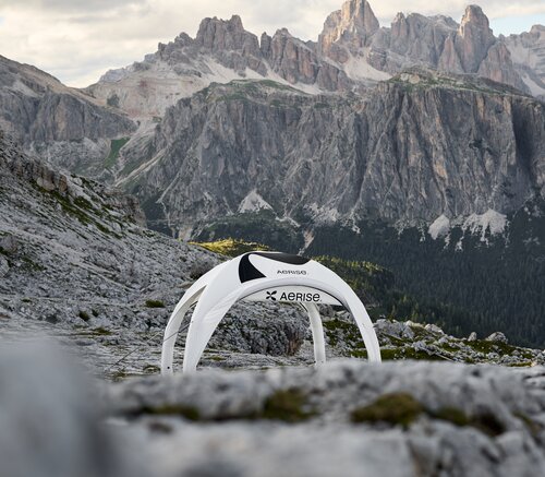 Inflatable tent in the Dolomites Inflatable tent in white set against rugged mountain scenery